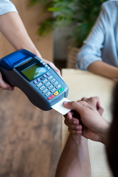 payment by credit card and terminal - Fotó, kép