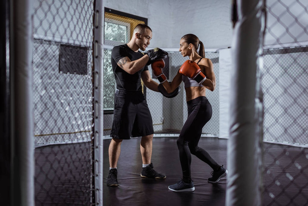 trainer and female boxer - Photo, Image