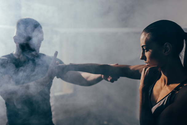 trainer and female boxer - Фото, изображение