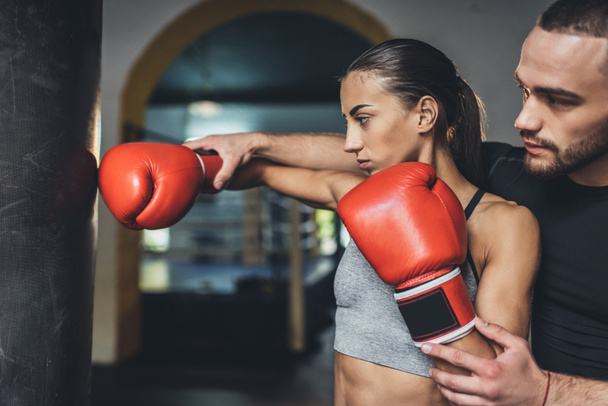 trainer and female boxer - Foto, Bild