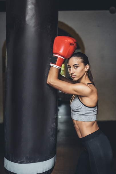 female boxer with punching bag - Photo, Image
