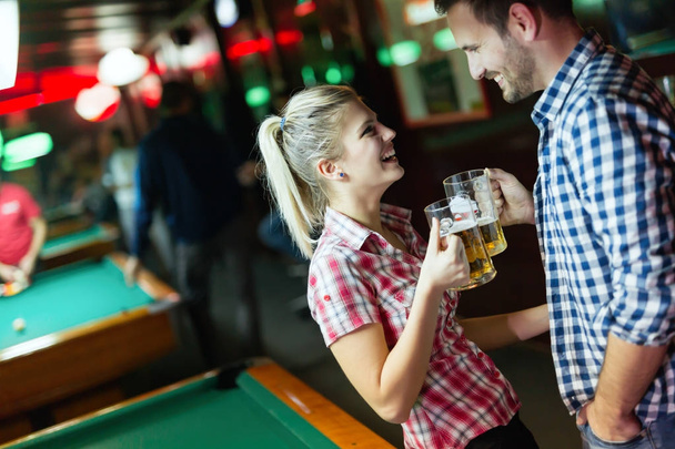 Young couple on date at snooker club - Foto, Imagem