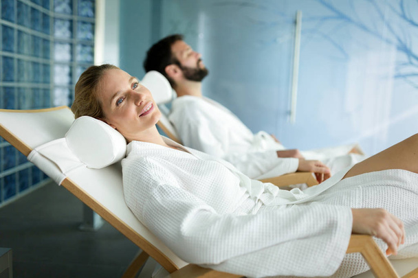  man and beautiful woman relaxing in spa - 写真・画像