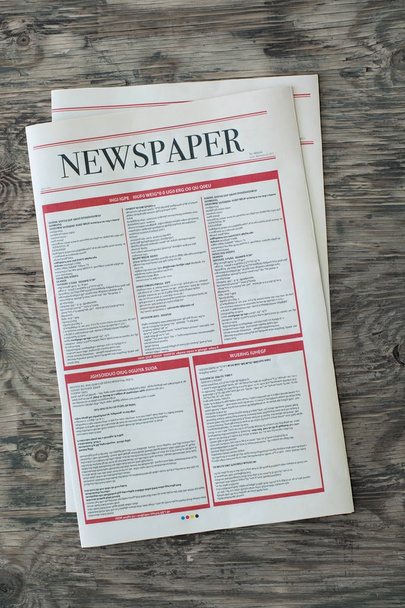 Mock up newspaper on wooden background - Photo, Image