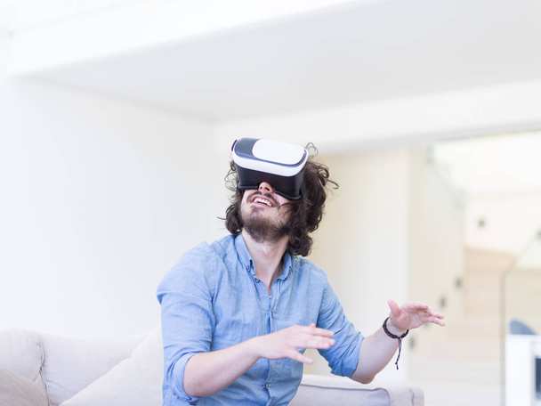 man getting experience using VR  - Fotoğraf, Görsel
