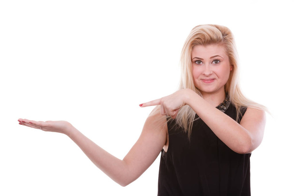 Blonde woman pointing with hands at copyspace - Photo, Image