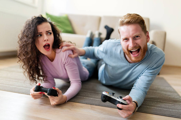 couple playing video games - Photo, Image