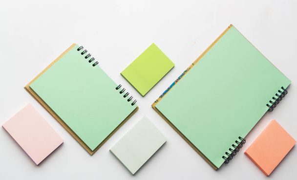 Modern samples of stationery, notebooks, stickers and pencils. - Photo, Image