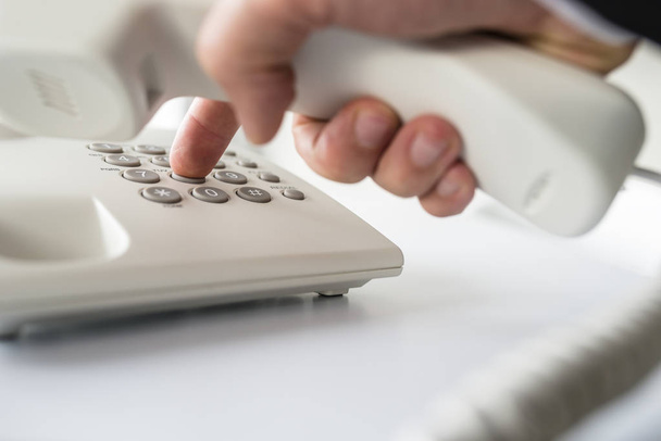 Closeup of businessman making a telephone call - Photo, Image