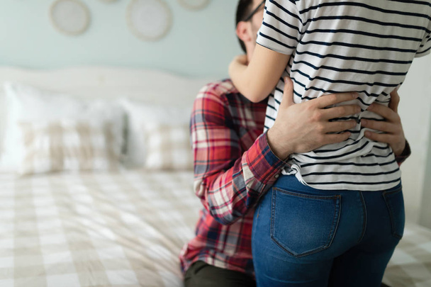 couple having romantic time in bed - Photo, image