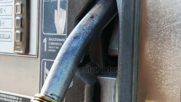 Gasoline or petrol station gas fuel pump nozzle. Filling station. Close-up of using fuel nozzles at a gas station. - Footage, Video