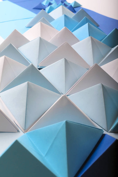 Abstract blue tone paper poly made from tetrahedron background. Usefull for business cards and web. - Фото, зображення