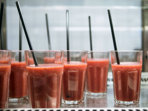 Strawberry smoothies, juice in glasses on a show-window - Photo, image