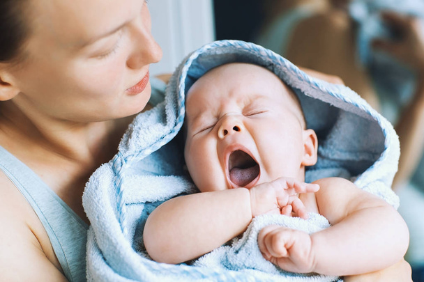 Yawning cutest baby after bath with towel on head.  - Φωτογραφία, εικόνα