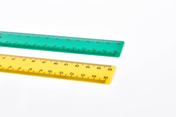 Two colorful rulers, white background. - Photo, Image