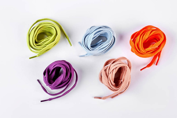 Five colorful round shoe laces. - Foto, Bild