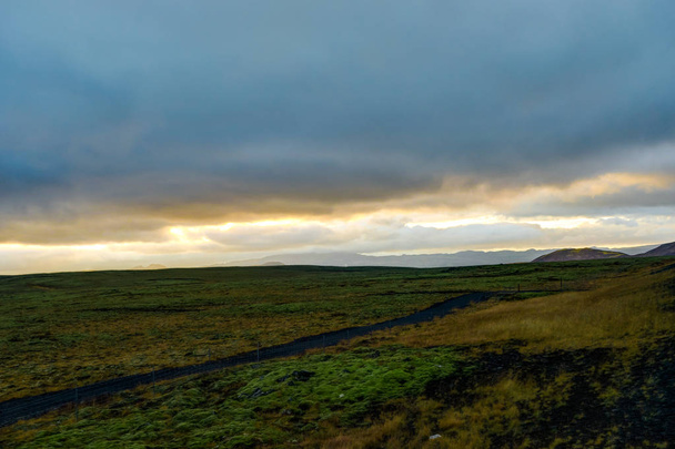 Sunset over Iceland Landscape with green moss during golden hour - Foto, immagini