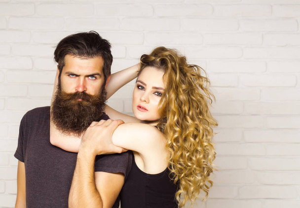 Girl and bearded hipster - Фото, изображение