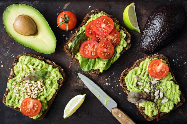 Healthy green veggie avocado toast with sprouts - Фото, изображение