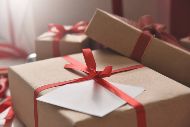 Brown gift boxes with a white note paper. - Foto, Imagem