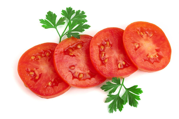 tomato slice with leaf parsley isolated on white background. Top view - Photo, Image