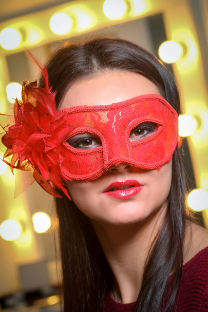 Beauty model woman wearing masquerade carnival mask over Christm - Photo, Image