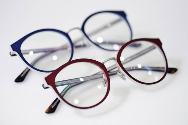 Modern fashionable spectacles on white background - Foto, Bild