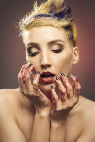 Young Woman With Glittered Hands And Lips - Foto, Imagen