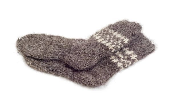 Chaussettes tricotées à la main en laine épaisse sur fond blanc
 - Photo, image