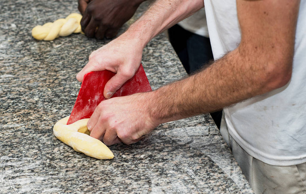 the baker prepares bread dough - Photo, Image