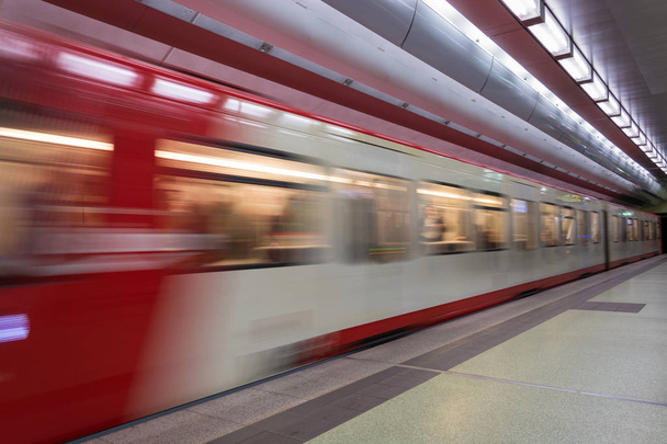 Moving red and white subway in the underground - Photo, Image