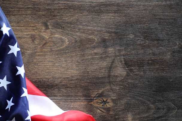American flag on a wooden texture table - Φωτογραφία, εικόνα