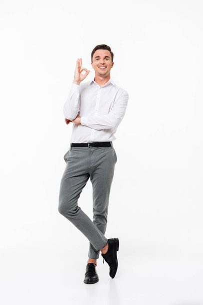 Full length portrait of a happy attractive man - Photo, Image