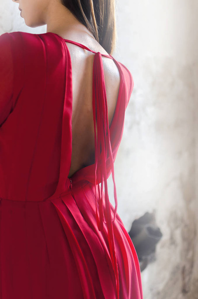 Lady in red dress with naked back - Zdjęcie, obraz