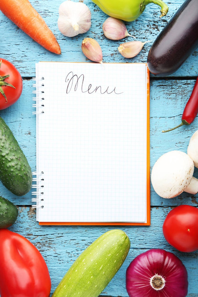 Blank menu book with vegetables  - Fotó, kép