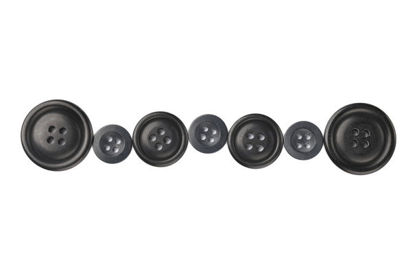 farklı boyutlarda siyah kumaş düğmeleri - Fotoğraf, Görsel