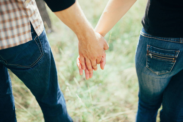 couple holding hands - Photo, Image