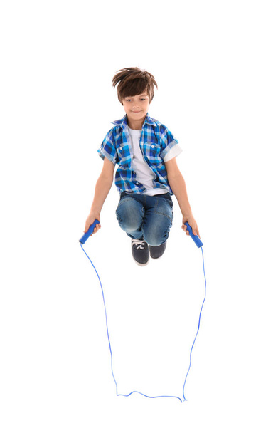 Cute little boy jumping rope  - Фото, зображення