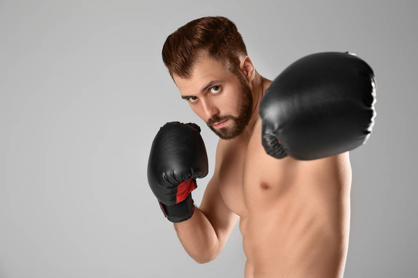 Male boxer on background - Foto, imagen