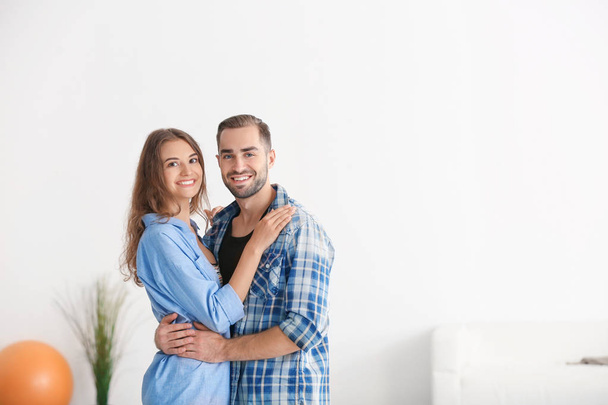 Young happy couple at new home - Foto, Imagem