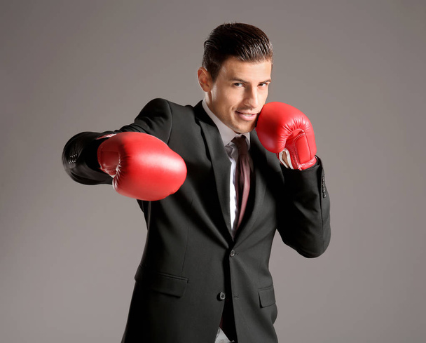 Businessman in boxing gloves  - Photo, image