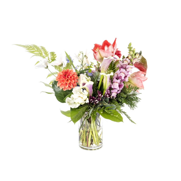 Bouquet de fleurs mélangées dans un vase en verre
  - Photo, image