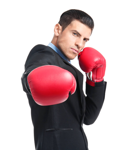 Businessman in boxing gloves  - Foto, afbeelding