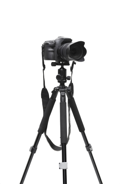 A digital camera on a tripod - Photo, Image
