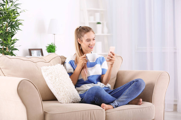 Young woman using smartphone - Photo, Image