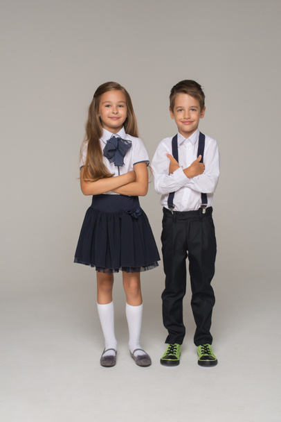  kids dressed in school uniform posing - Foto, afbeelding