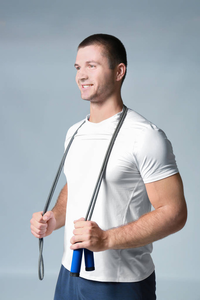 Young man with jumping rope - Photo, Image