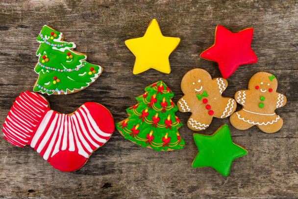 Festive tasty Christmas cookies on wooden table. Top view - Photo, Image