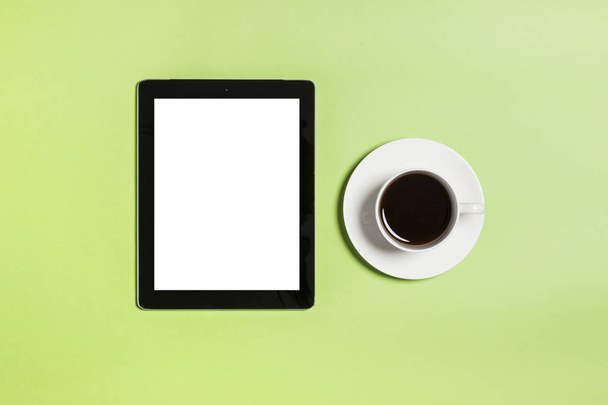 tablet computer with coffee background. - Photo, Image