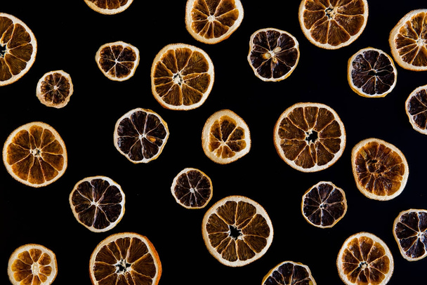 Creative image of dried orange slices - Φωτογραφία, εικόνα